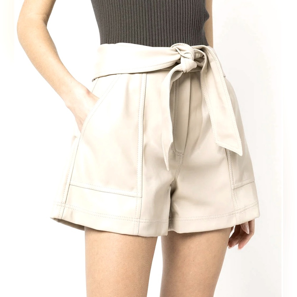 Paper bag style. Tie belt. Vegan leather